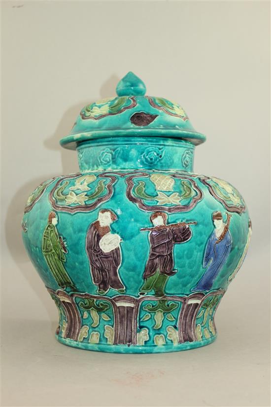 A Chinese Fahua decorated baluster jar and cover, 18th / 19th century, 32cm.